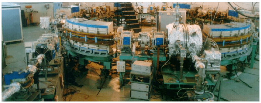 Fig. 25: 550 MeV Booster Synchrotron showing main dipole and quadrupole magnets and start of the transfer line -2.