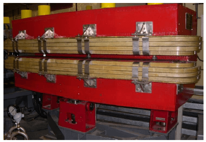 Fig. 29: Indus-2 Dipole magnet (Wt. ~ 10 MT) with support/positioning system.